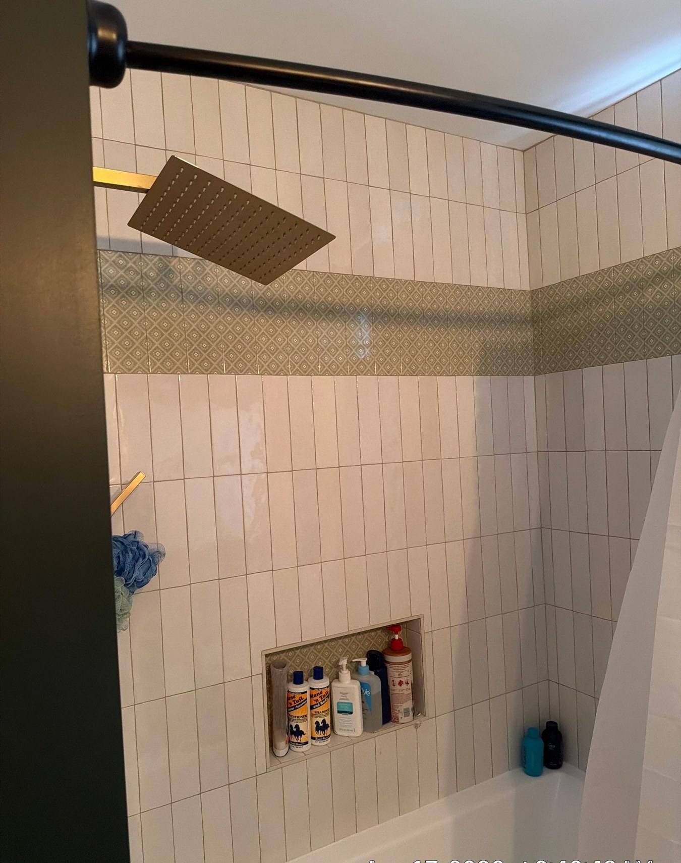 Tiled shower with built-in niche in a Cayce, SC bathroom remodel