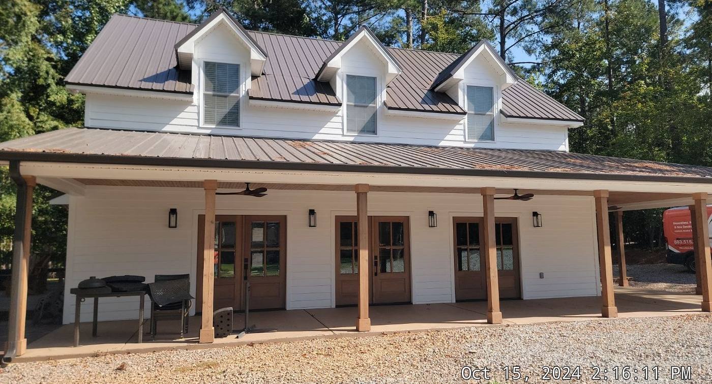 Finished custom home with wraparound porch and dormers in Batesburg-Leesville, SC