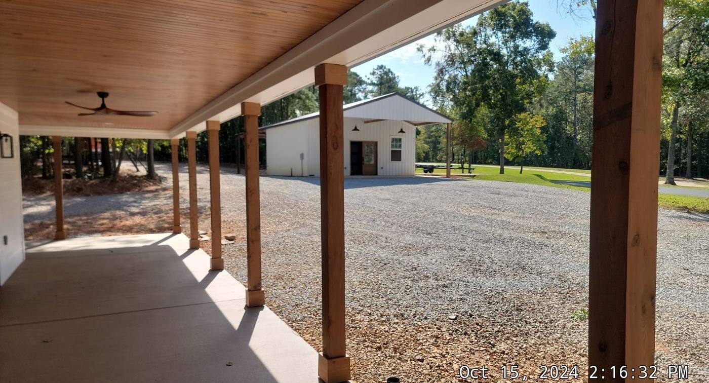 Full-length covered porch on a custom home in Batesburg-Leesville, SC