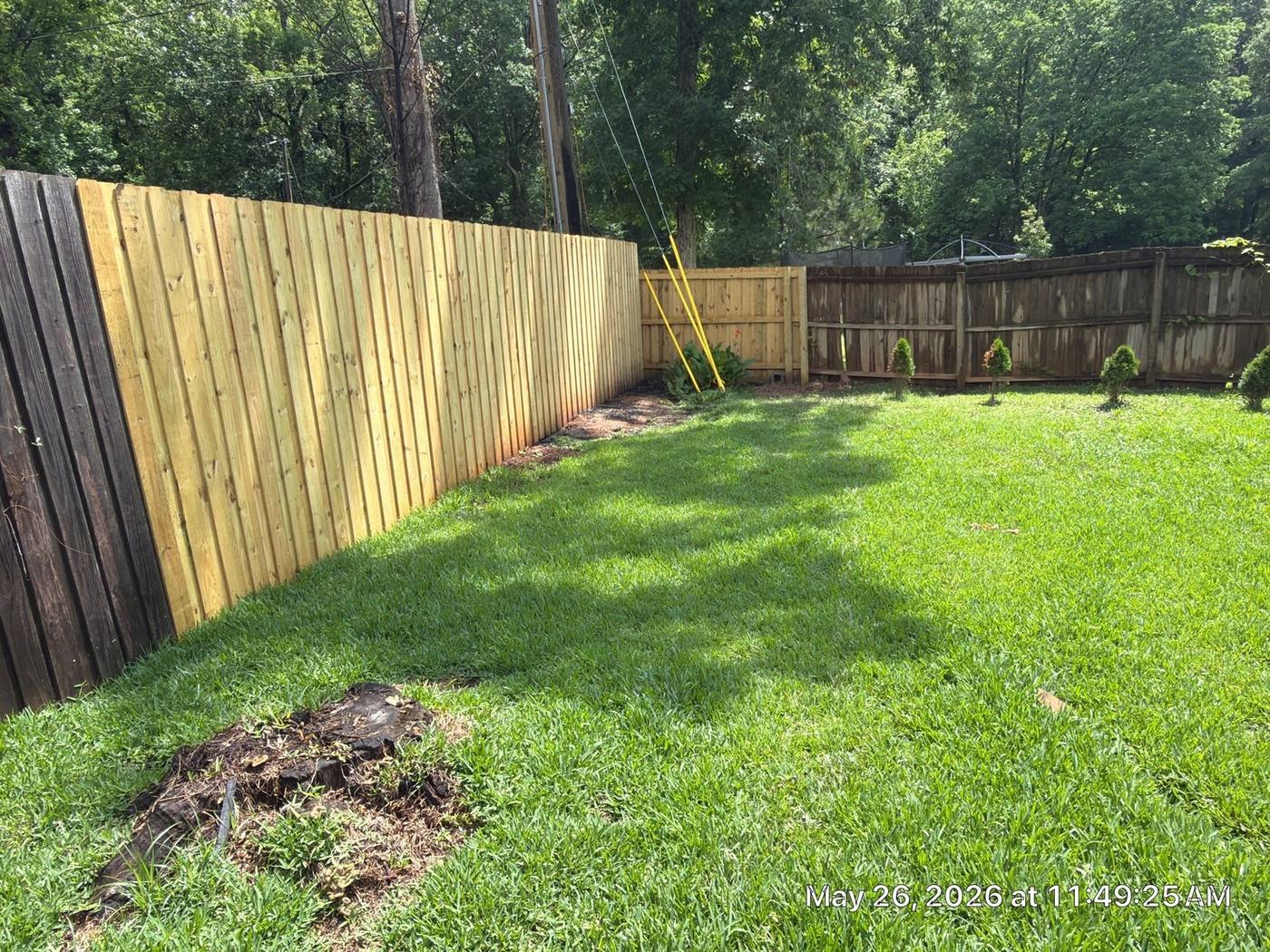 Replacement wood privacy fence after fire damage in Columbia, SC