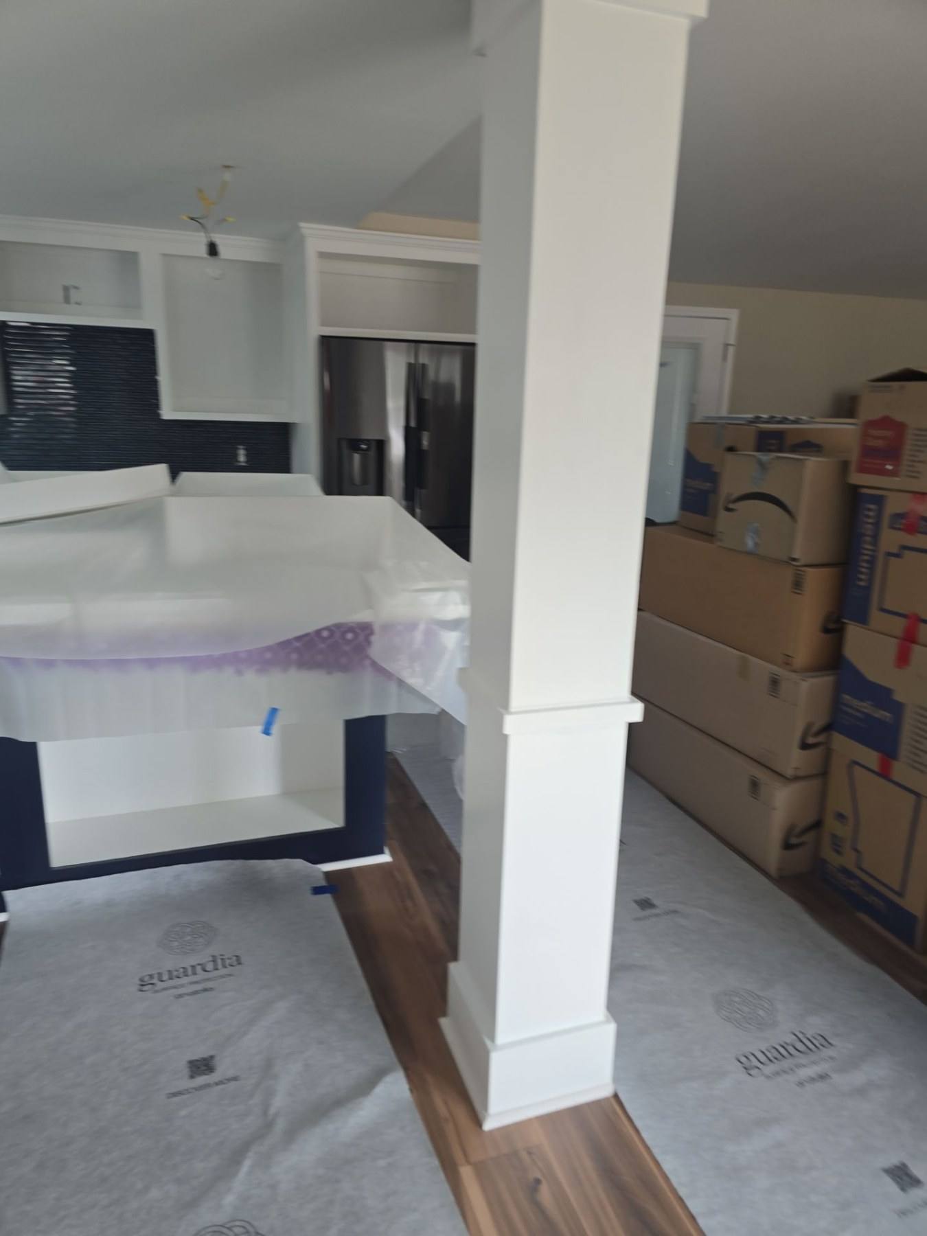 New white shaker kitchen with quartz counters in Prosperity, SC