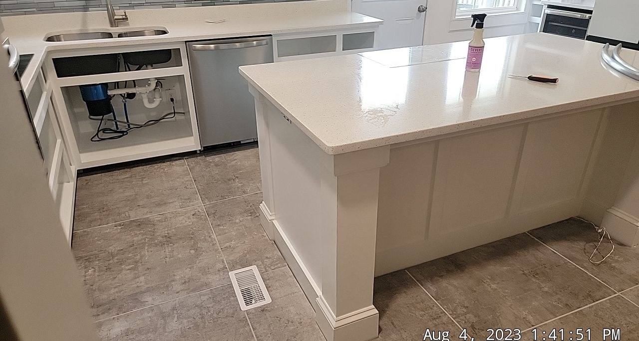 New white kitchen island with quartz counters in West Columbia, SC