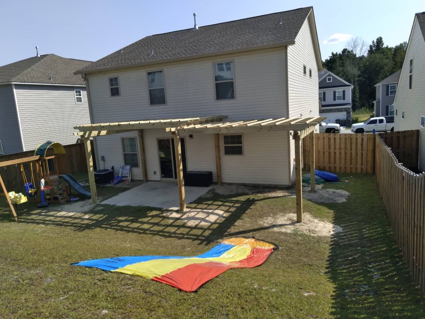 Cedar pergola built over a backyard patio in the Midlands of South Carolina