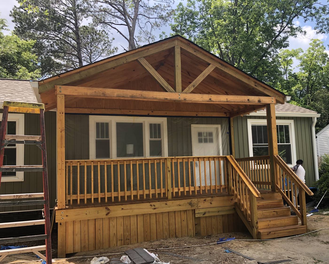 Cedar timber gable porch with railings and stairs on a bungalow in the Midlands of South Carolina